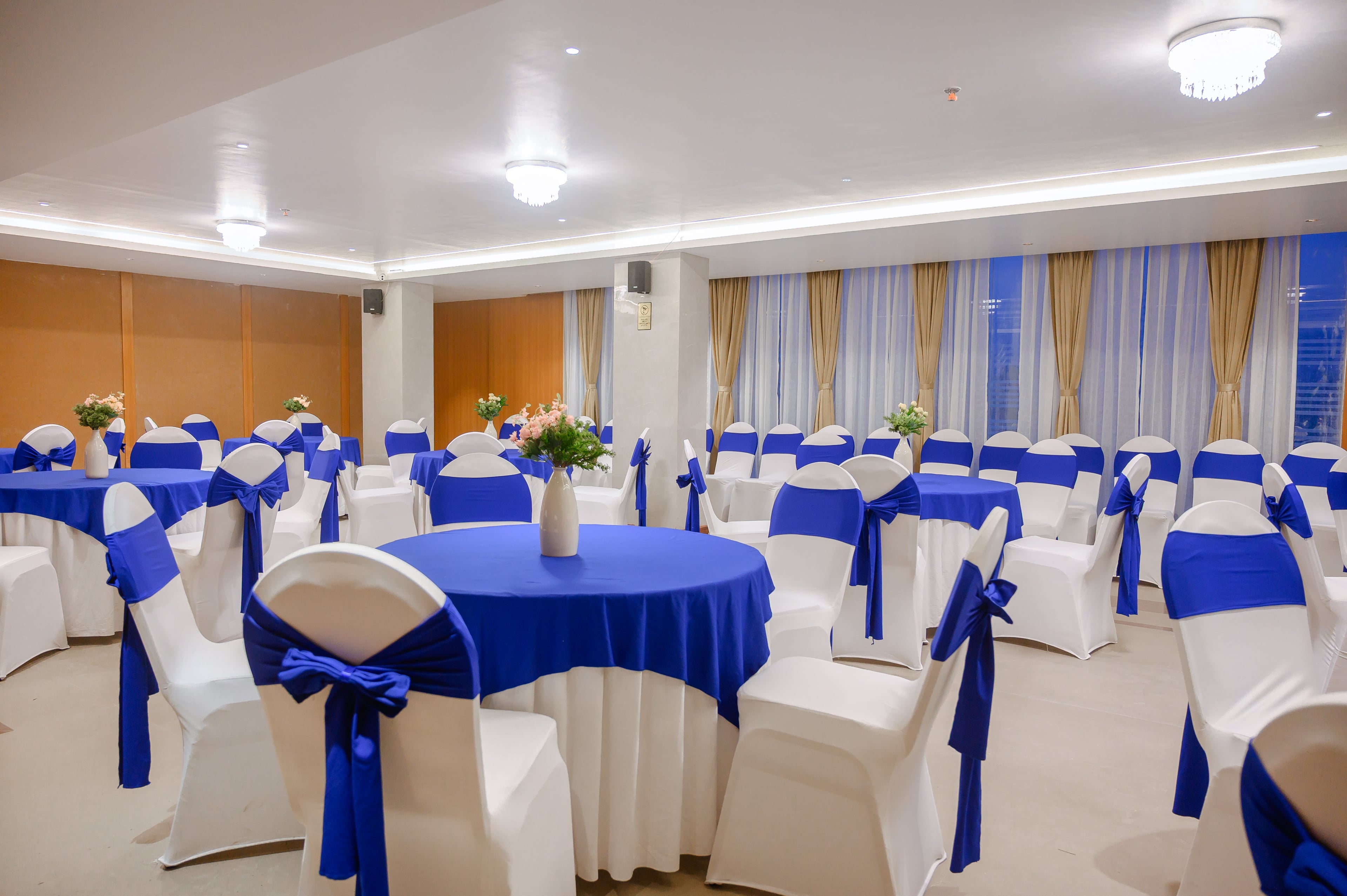 Elegant banquet hall with sophisticated lighting and seating